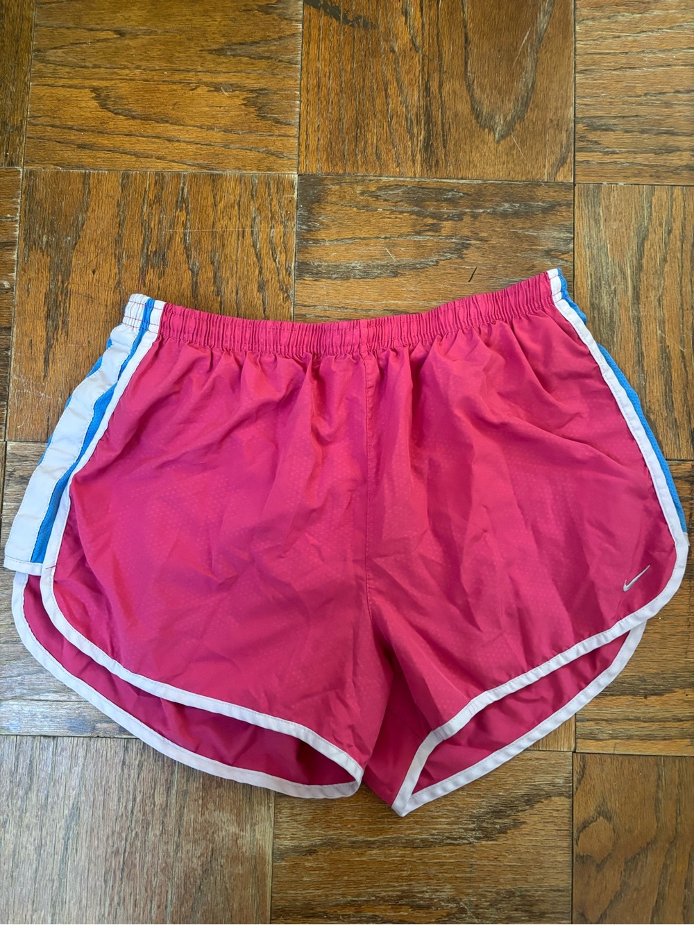 Nike Hot Pink Athletic Shorts with White Trim and Blue Accents